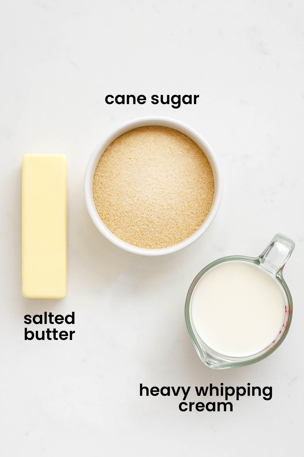 individual ingredients for caramel lollipops laid out against a white background.