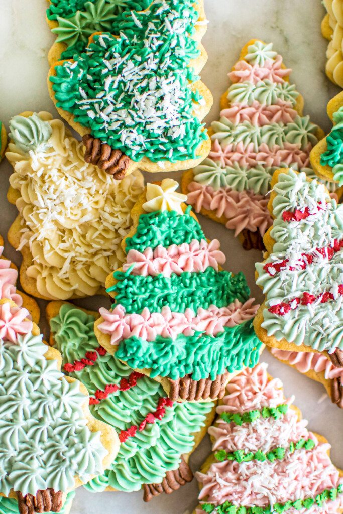 tree sugar cookies decorated with vibrant plant based frosting.