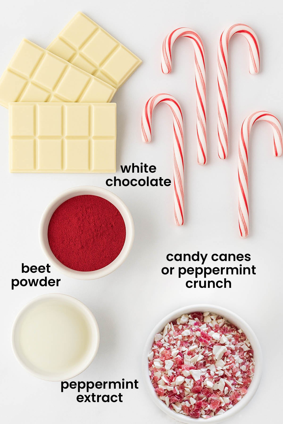 individual ingredients for pink peppermint ice laid out against a white background.
