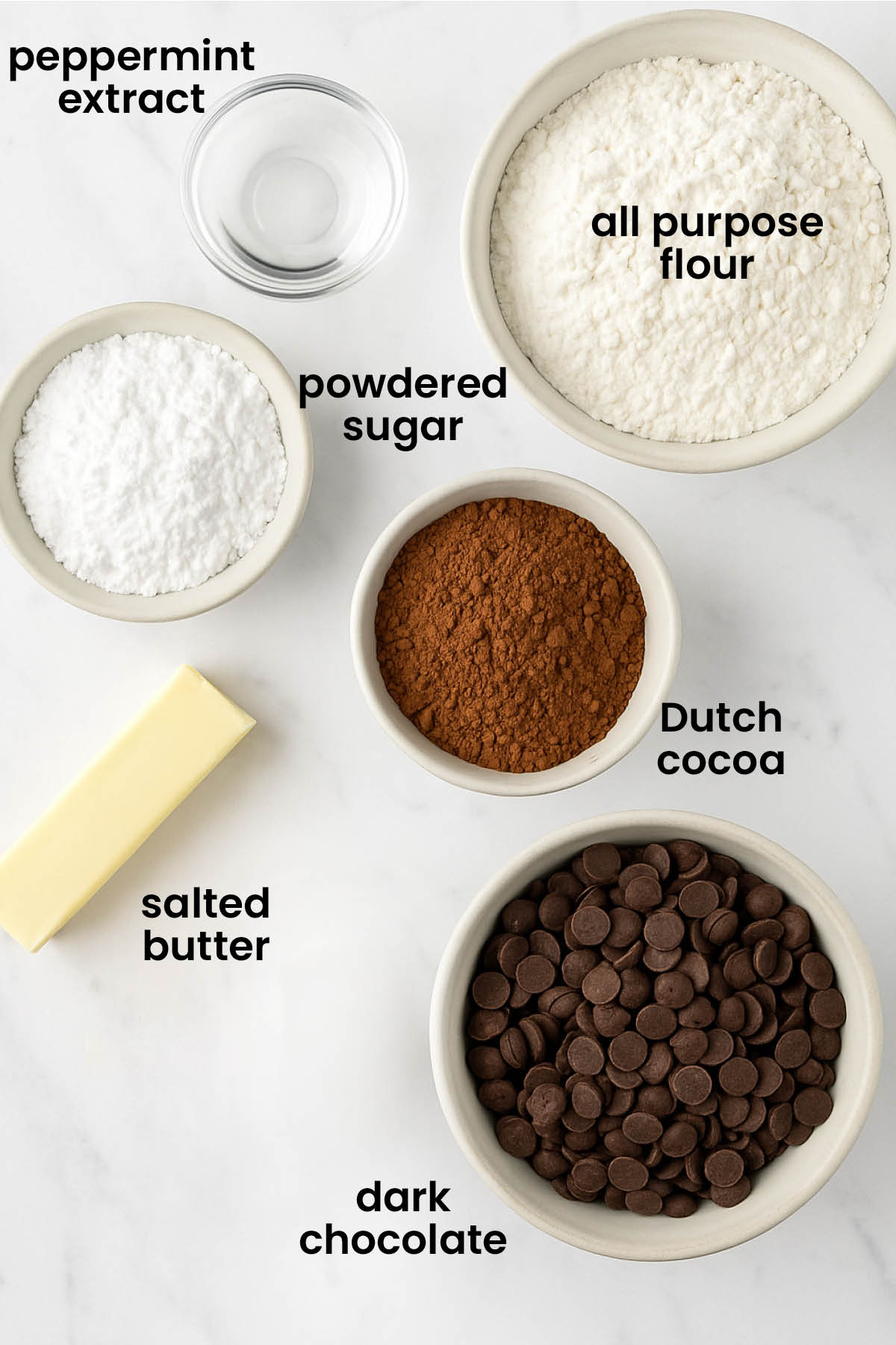 individual ingredients for homemade organic thin mint cookies laid out against a white background.