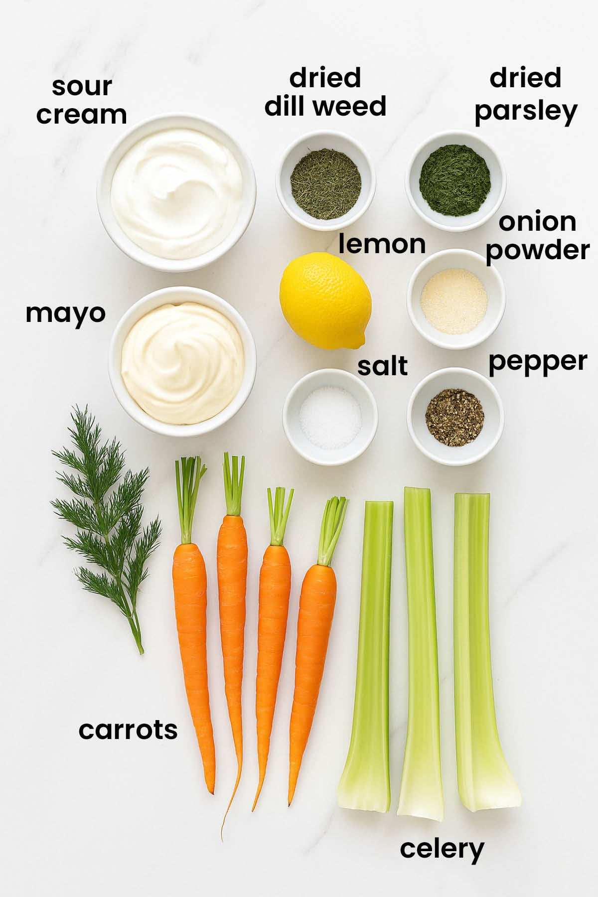 individual ingredients for organic dill dip with sour cream laid out against a white background.