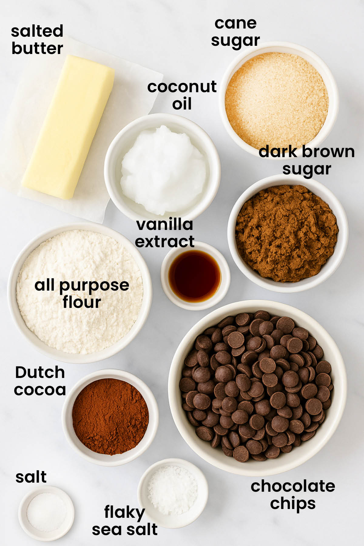 individual ingredients for chocolate sea salt mini cookies laid out against a white background.