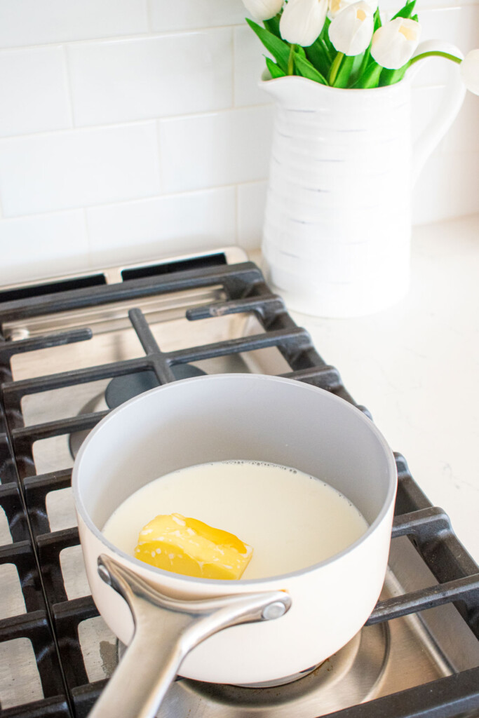 milk and butter in a small pot on the stovetop.