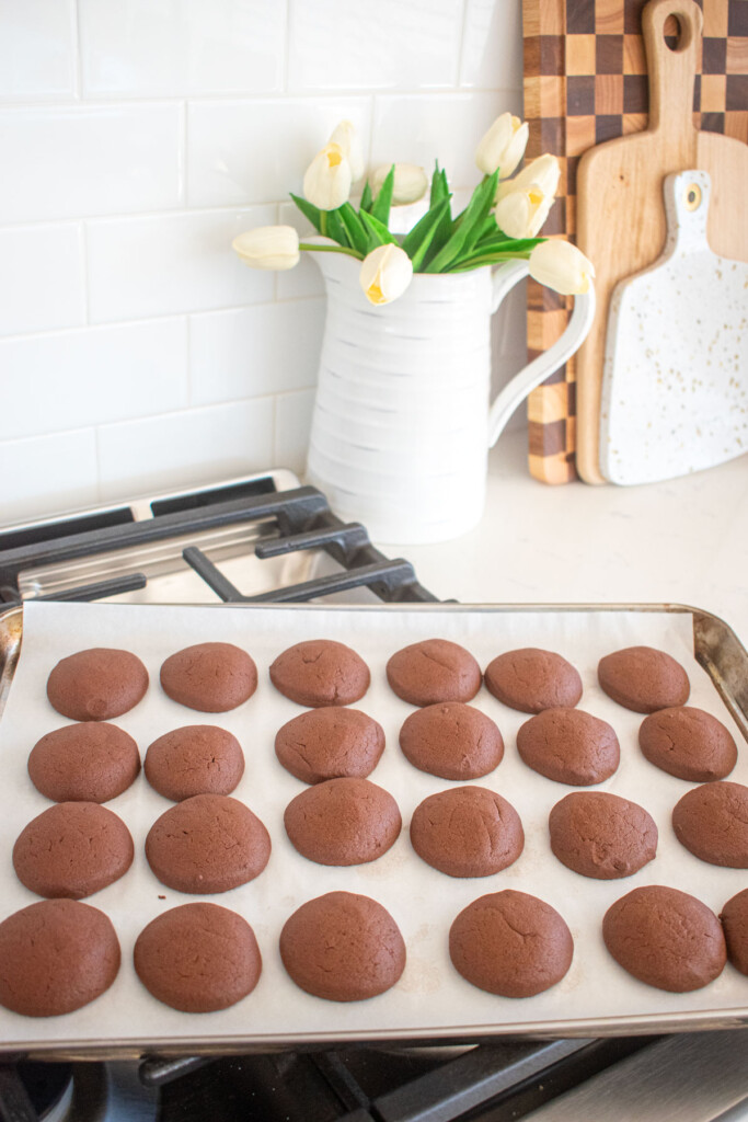 chocolate peppermint greek butter cookies on a baking sheet on the stovetop.