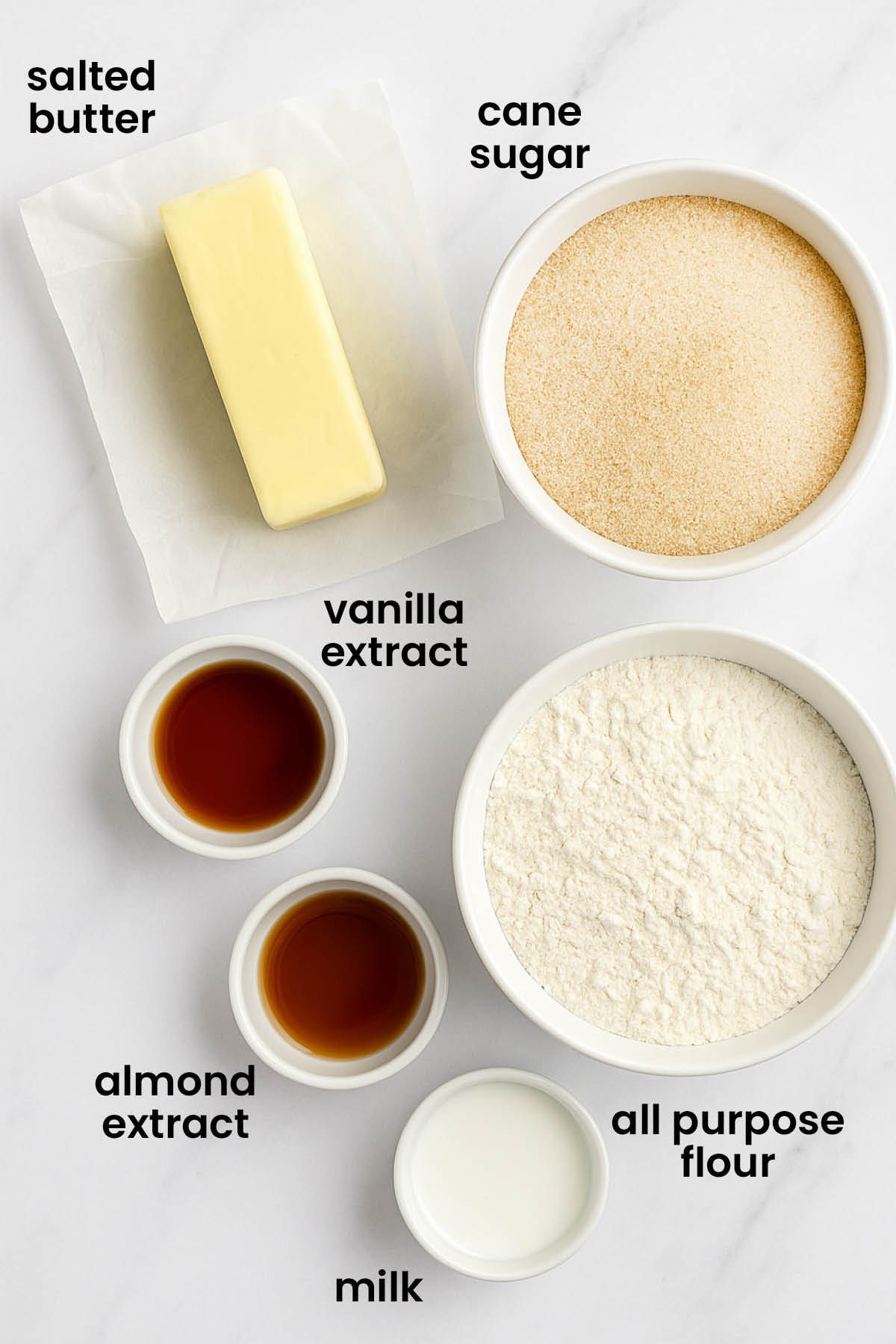 individual ingredients for eggless spritz cookies laid out against a white background.