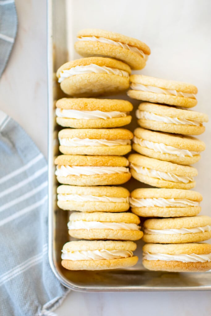 homemade vanilla oreo cookies on a baking sheet.