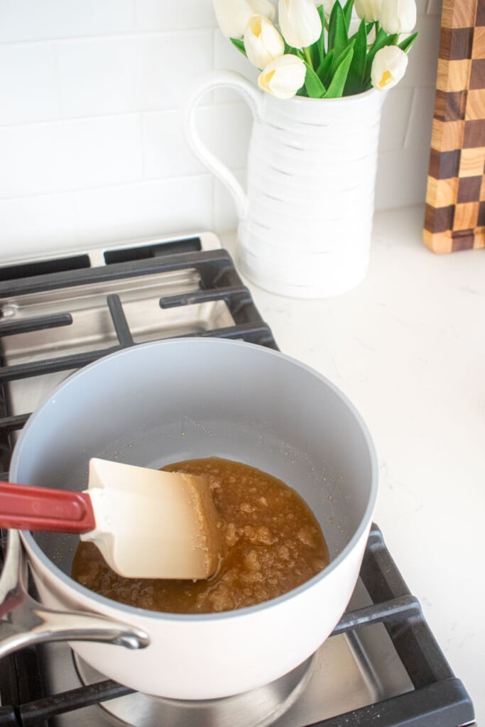 cane sugar melting, caramel being made on a stovetop.