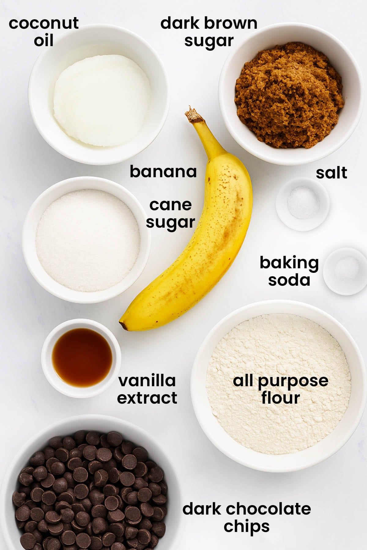 individual ingredients for vegan banana chocolate chip cookies laid out against a white background.