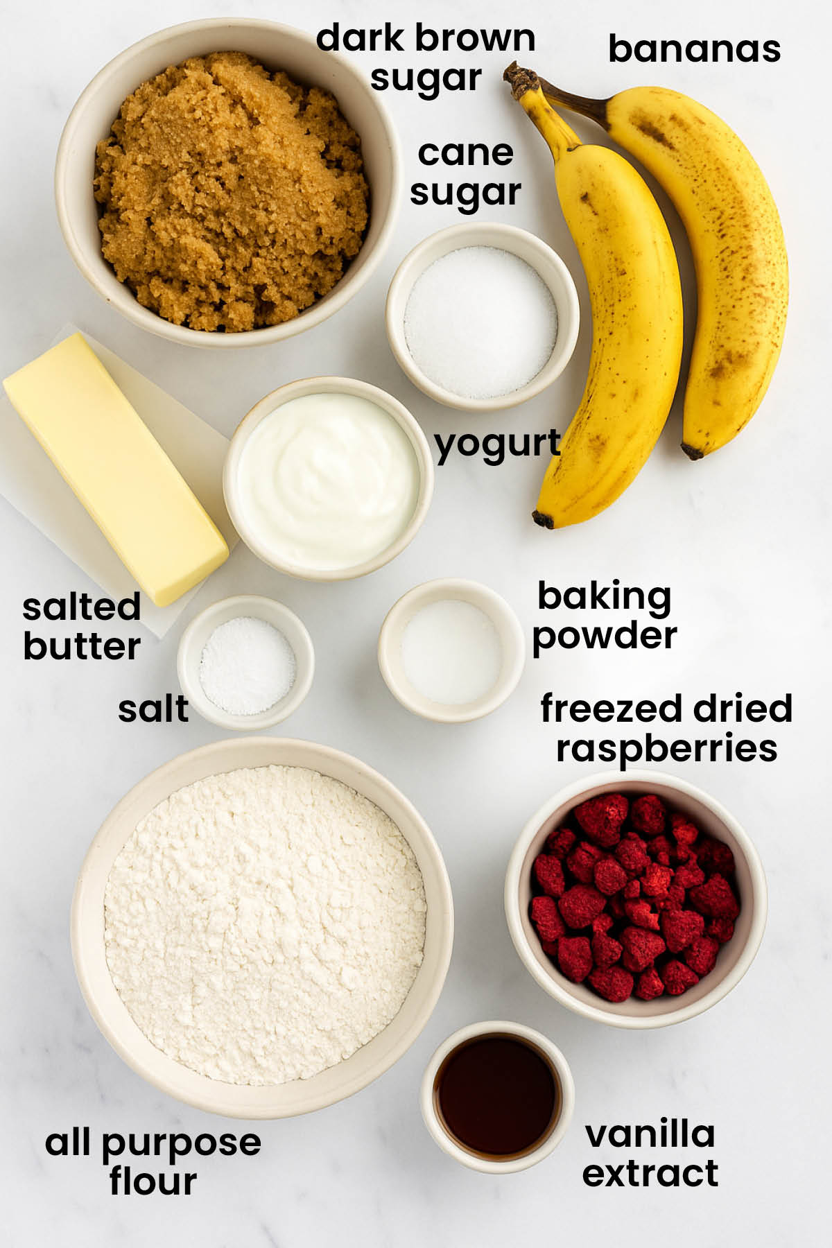 individual ingredients for eggless banana raspberry muffins laid out against a white background.
