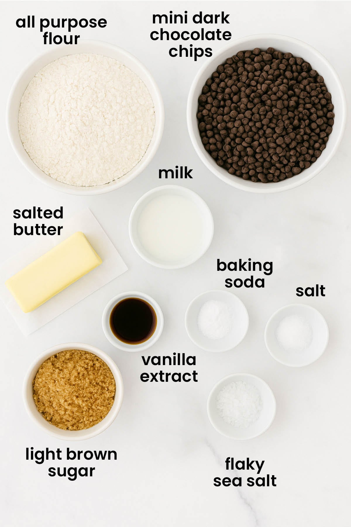 individual ingredients for eggless chocolate chip cookie cake laid out against a white background.