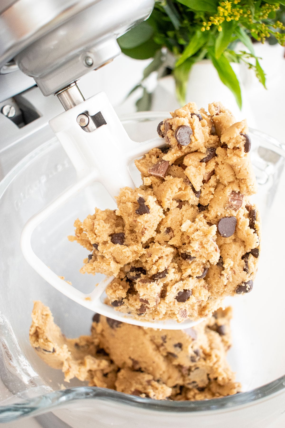 coffee creamer cookie dough in a stand mixer on the counter.
