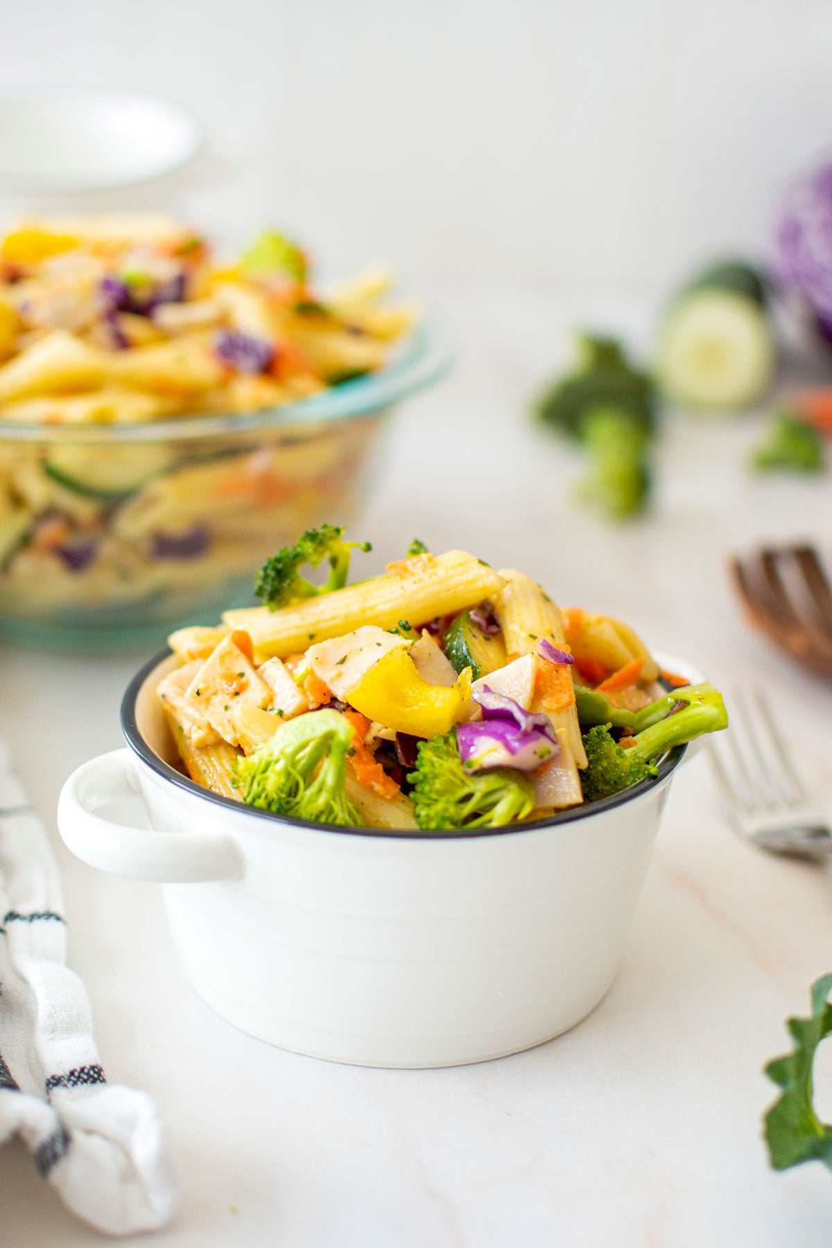 ranch pasta salad in a mini dutch oven on a marble countertop.