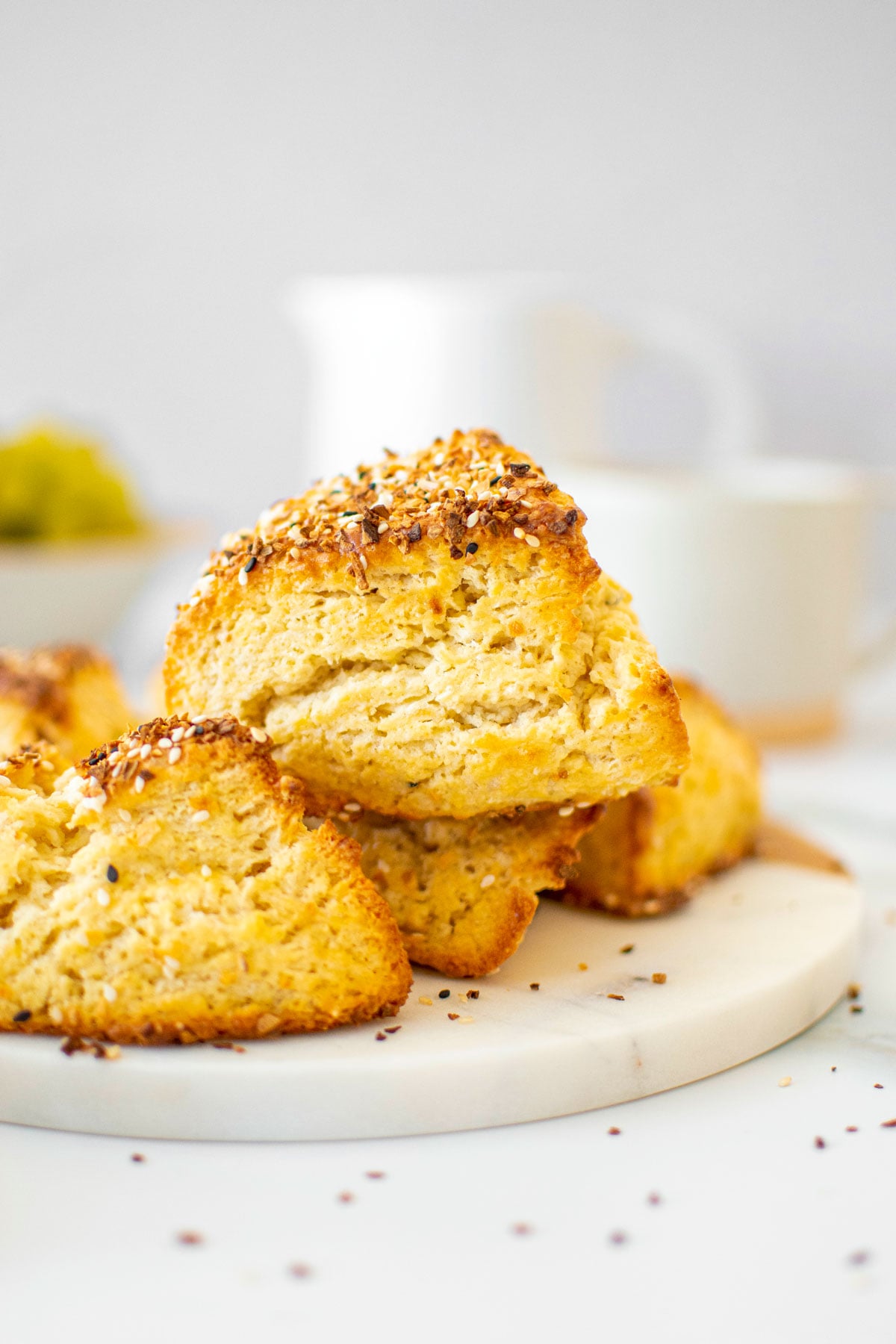 everything bagel scones on a marble serving tray.