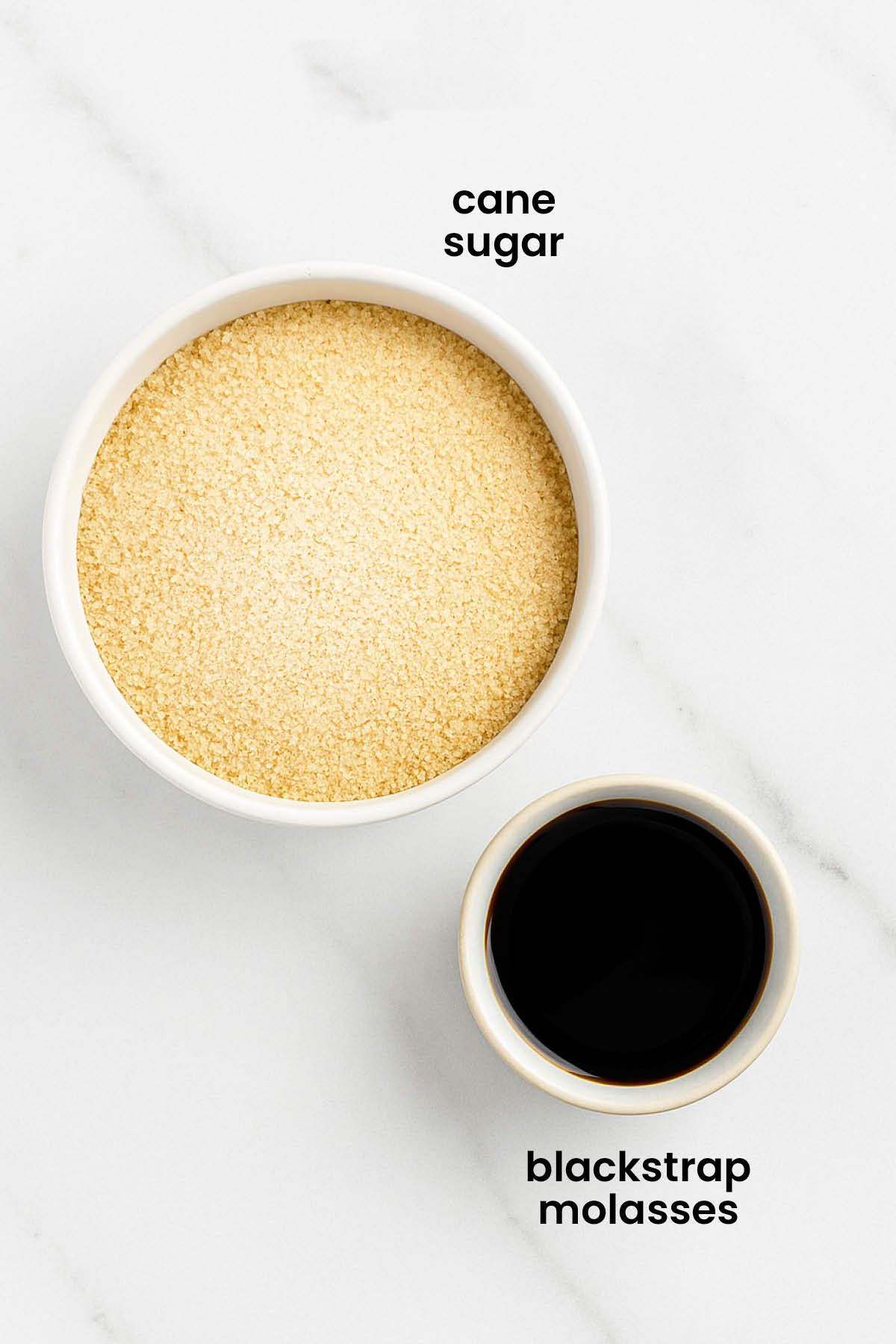 individual ingredients for homemade light brown sugar laid out against a white background.