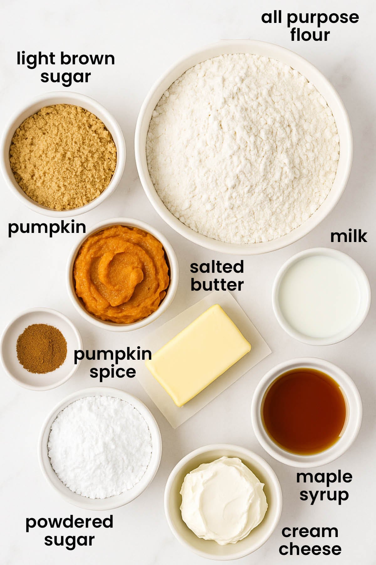 individual ingredients for eggless pumpkin scones laid out against a white background.