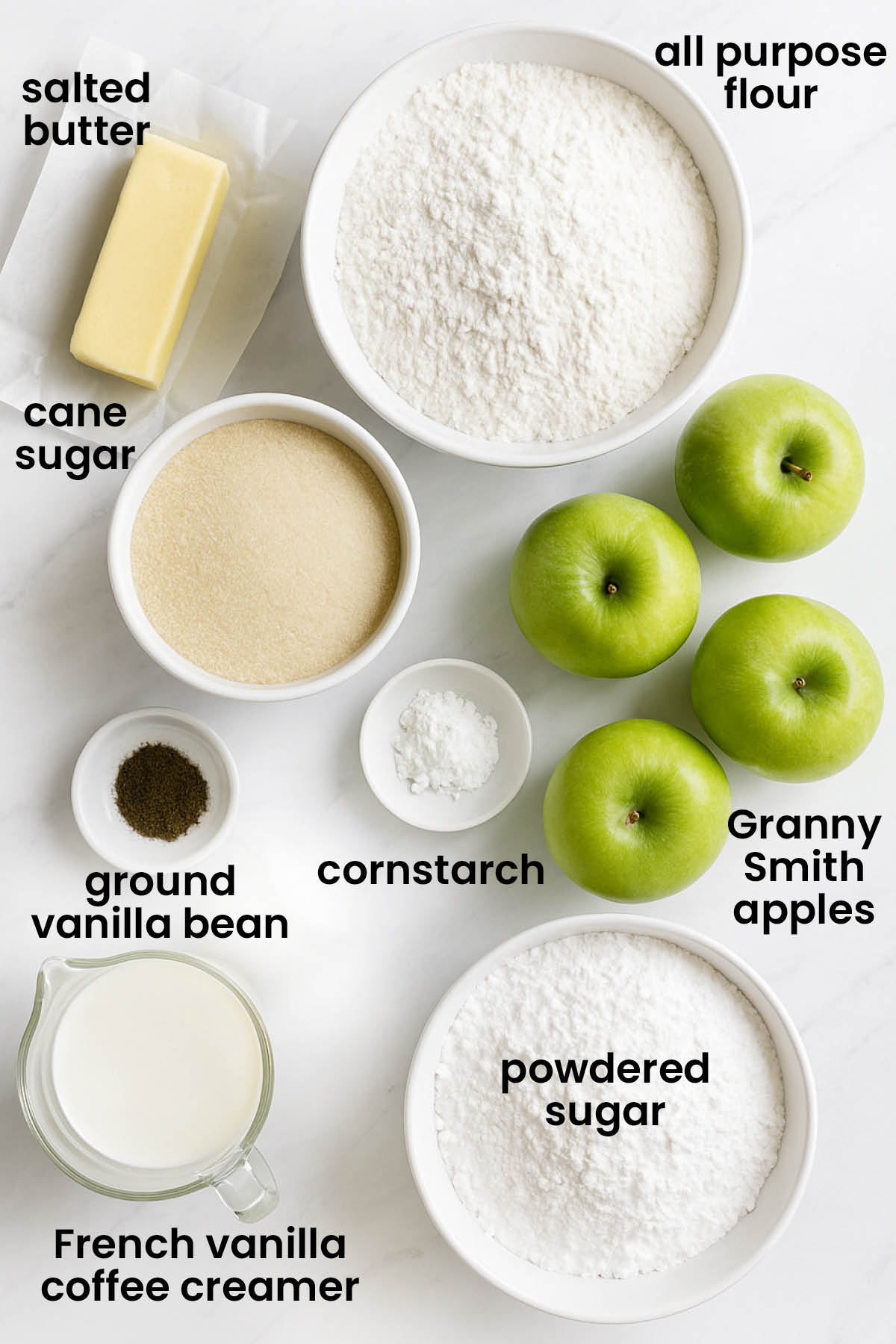 individual ingredients for vanilla bean apple pie laid out against a white background.