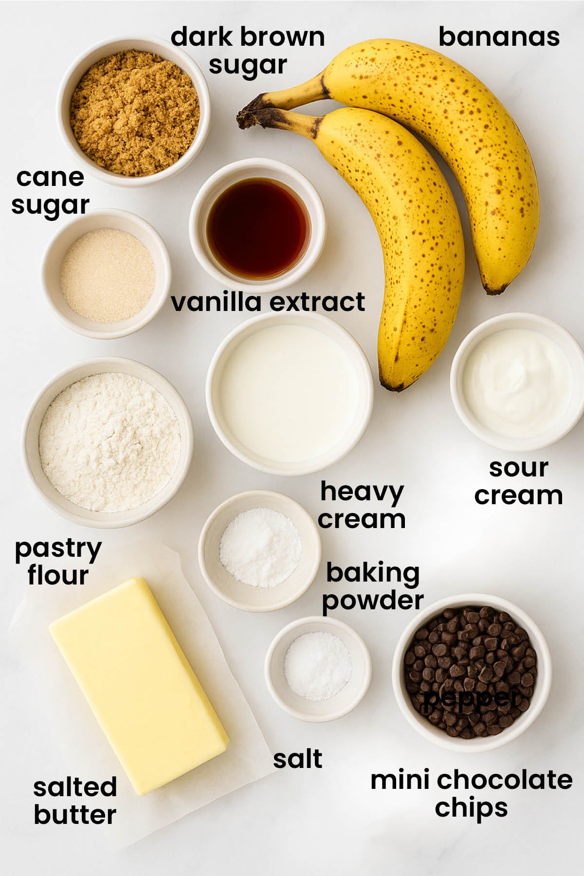 individual ingredients for eggless mini chocolate chip banana bread laid out against a white background.