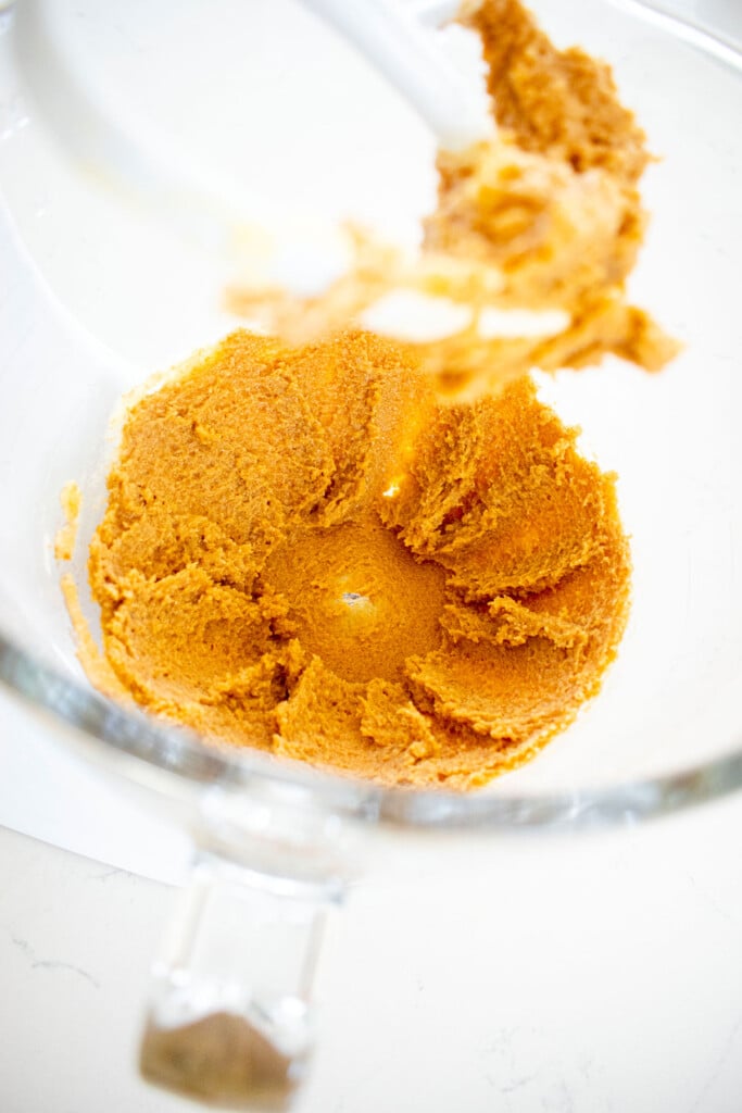 creamed butter and sugar in a glass mixing bowl.