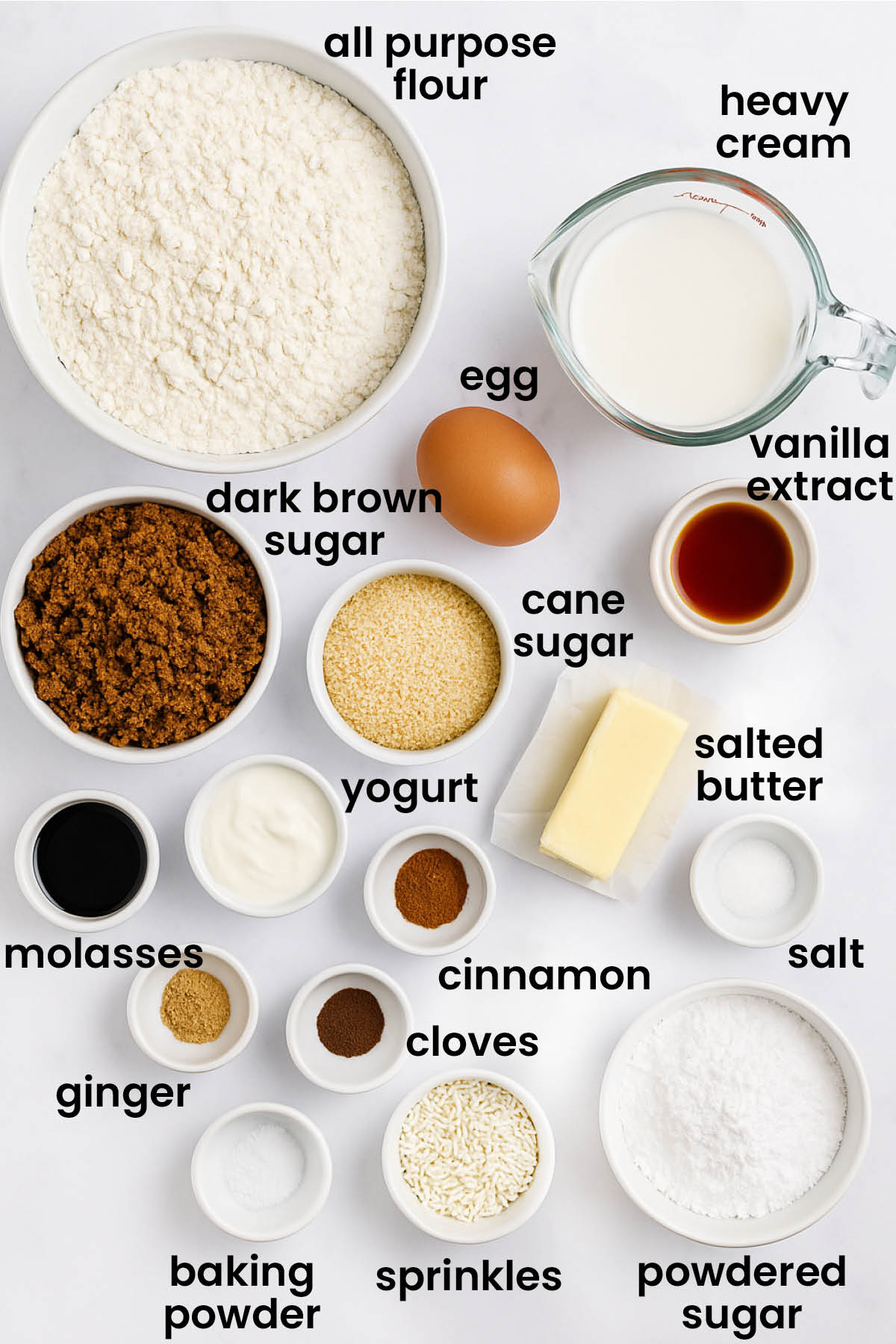 individual ingredients for frosted gingerbread baked donuts laid out against a white background.