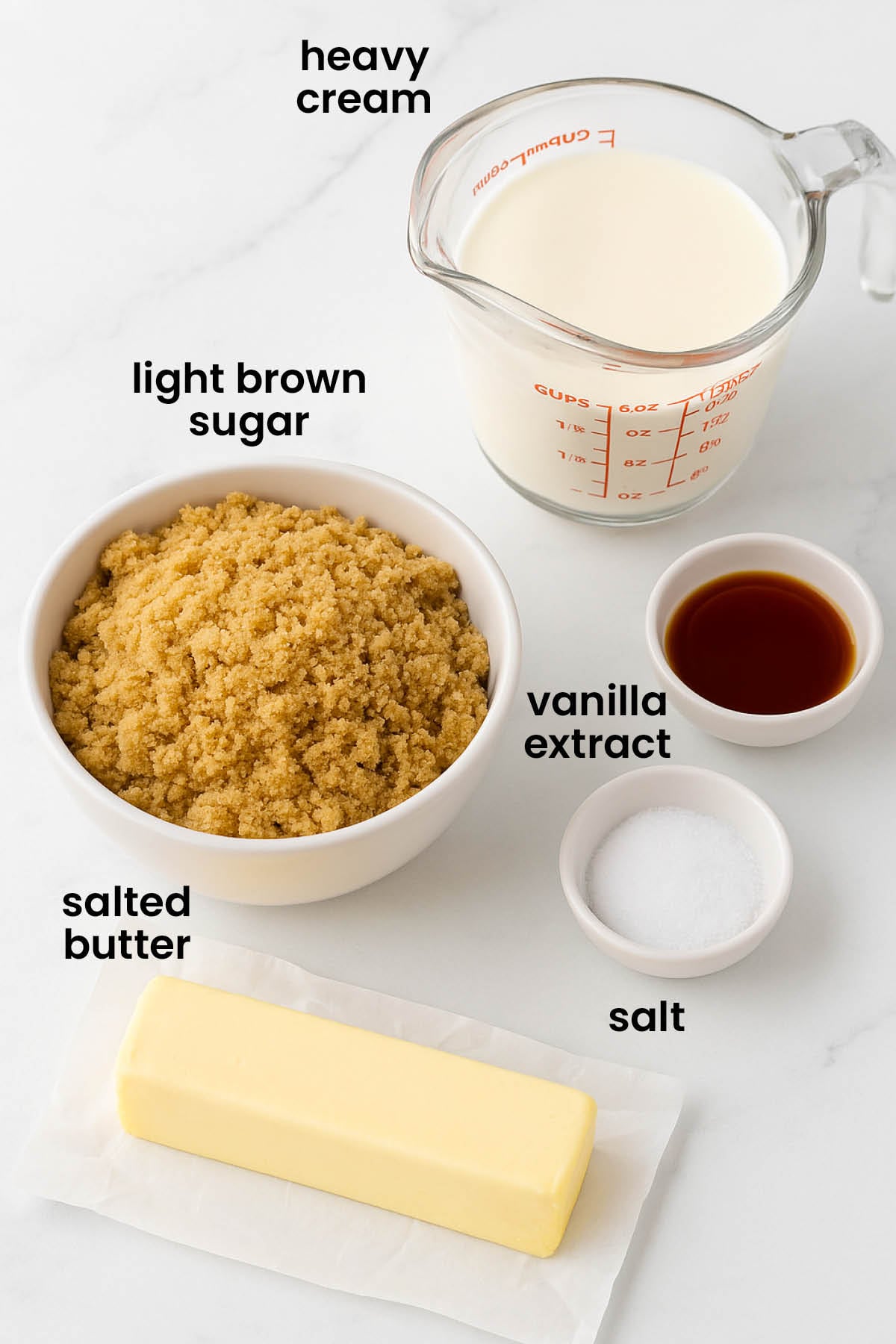 individual ingredients for brown butter butterscotch sauce laid out against a white background.