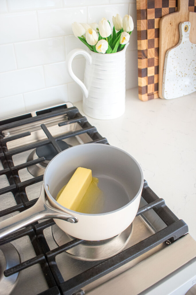 stick of butter in a small pot on the stovetop.