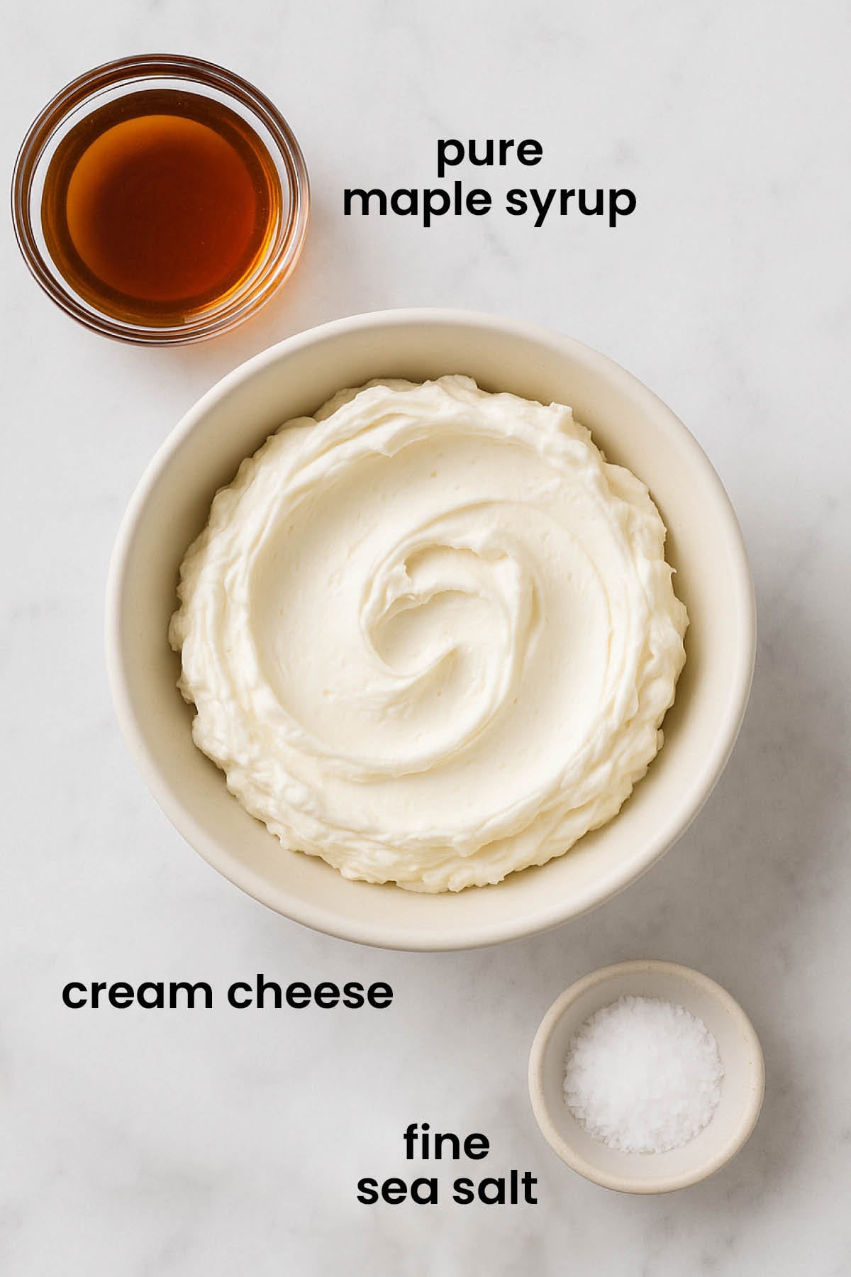 individual ingredients for maple cream cheese spread laid out against a white background.
