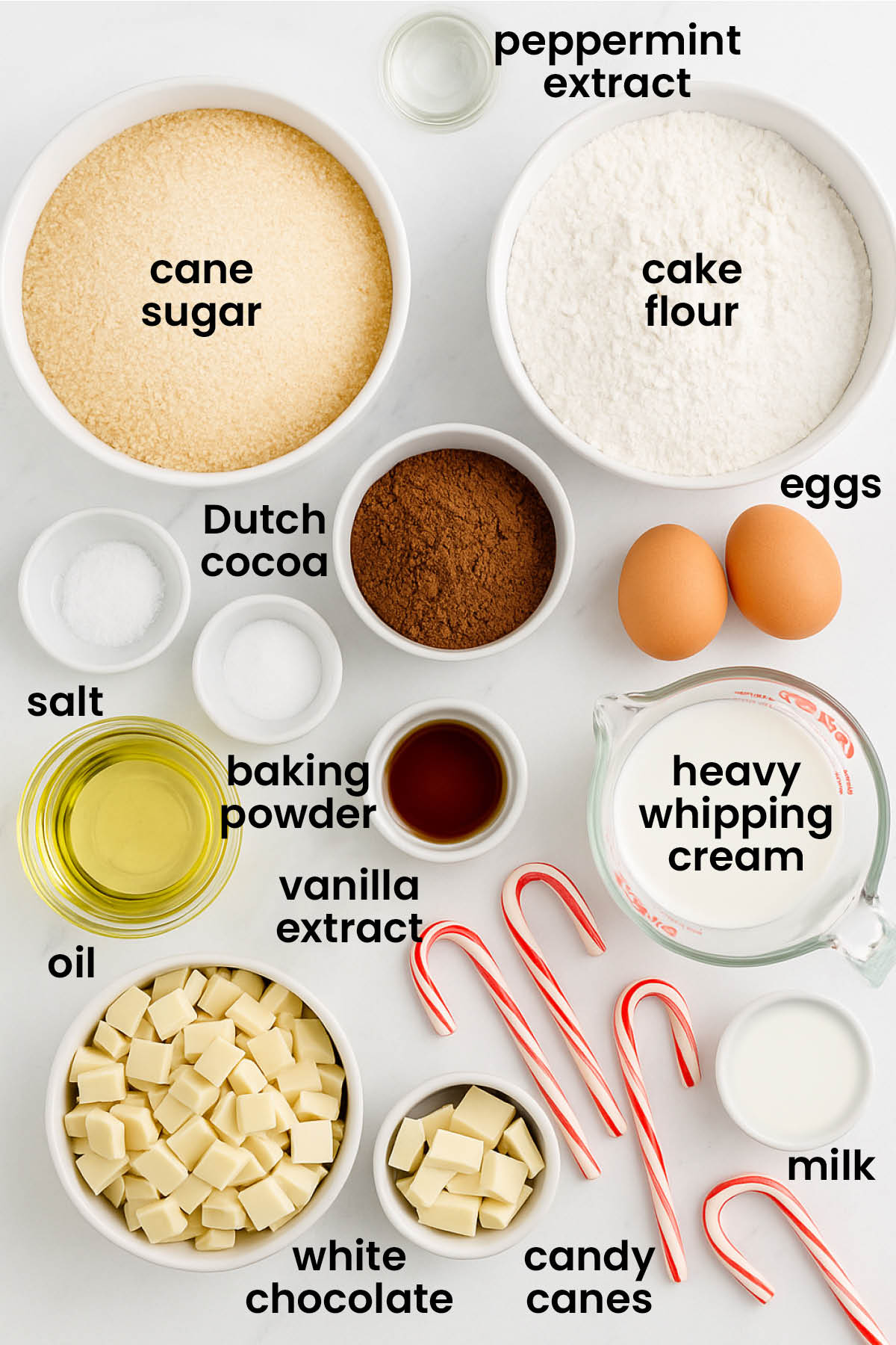 individual ingredients for peppermint bark snack cake laid out against a white background.