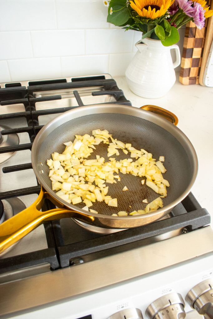 satued onions in a skillet on the stovetop.