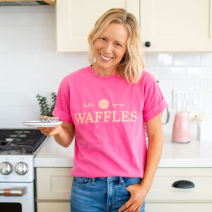 girl wearing waffles tee shirt in the kitchen