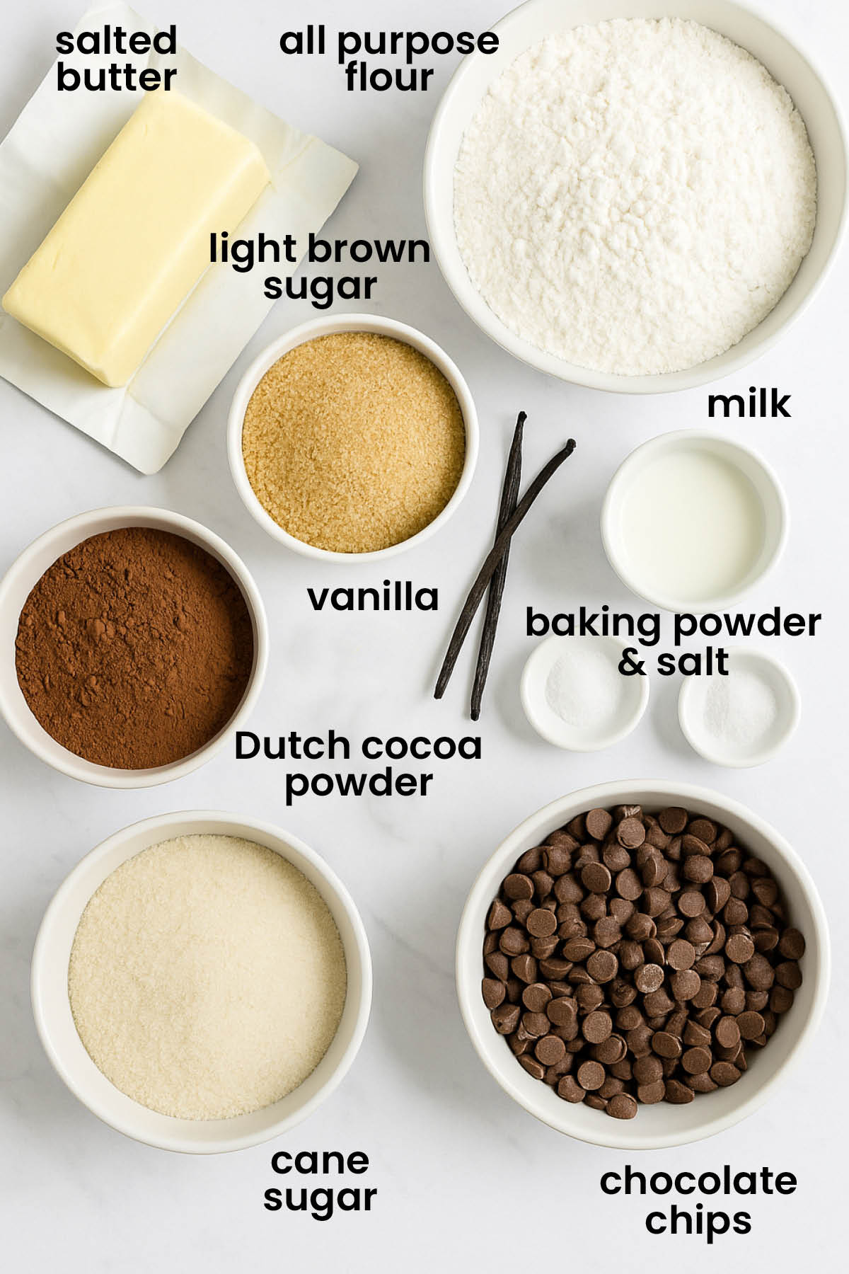 individual ingredients for eggless chocolate chocolate chip cookies laid out against a white background.
