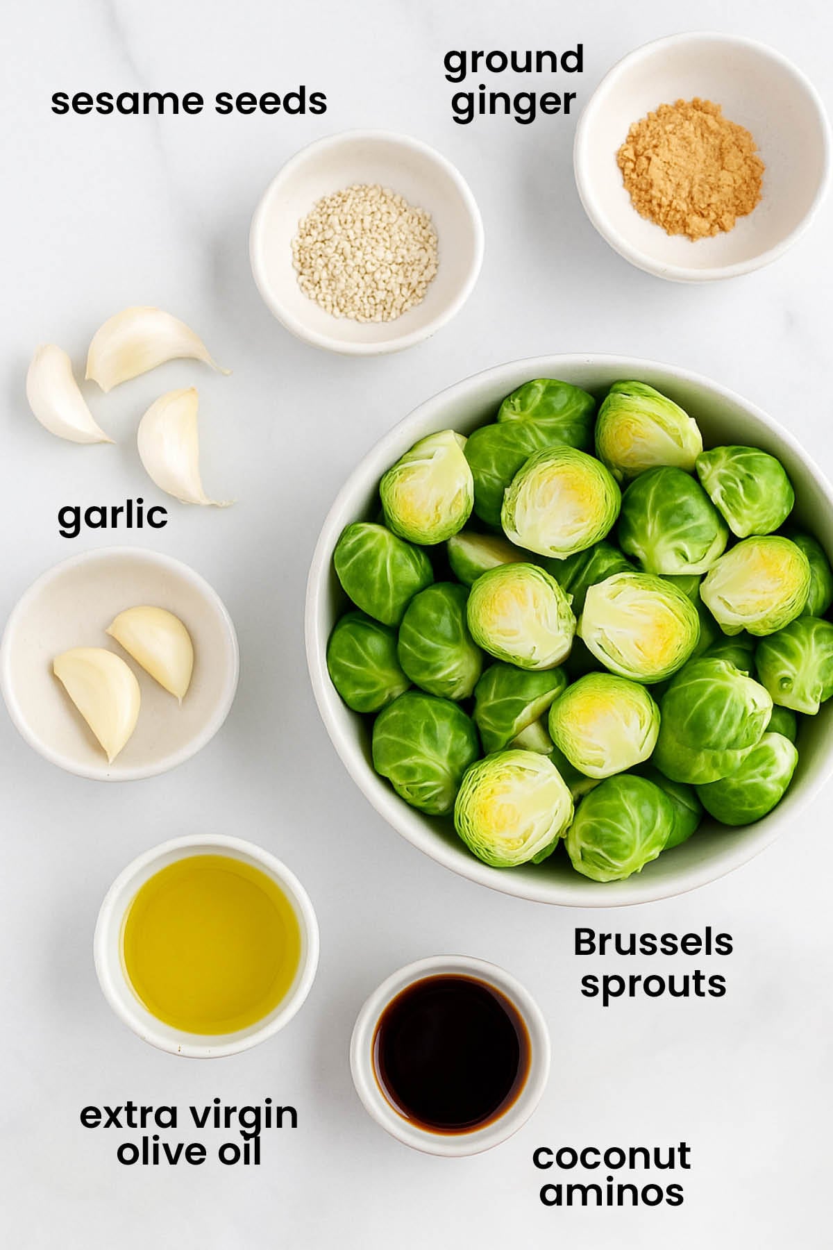 individual ingredients for sesame ginger Brussels sprouts laid out against a white background.