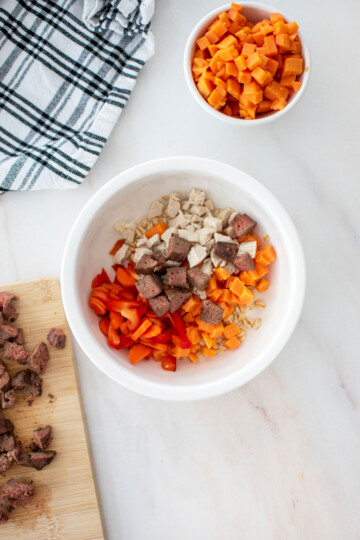 beef liver dinner for dogs in a dog bowl on the counter.