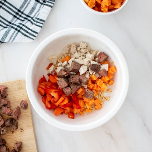 beef liver dinner for dogs in a dog bowl on the counter.