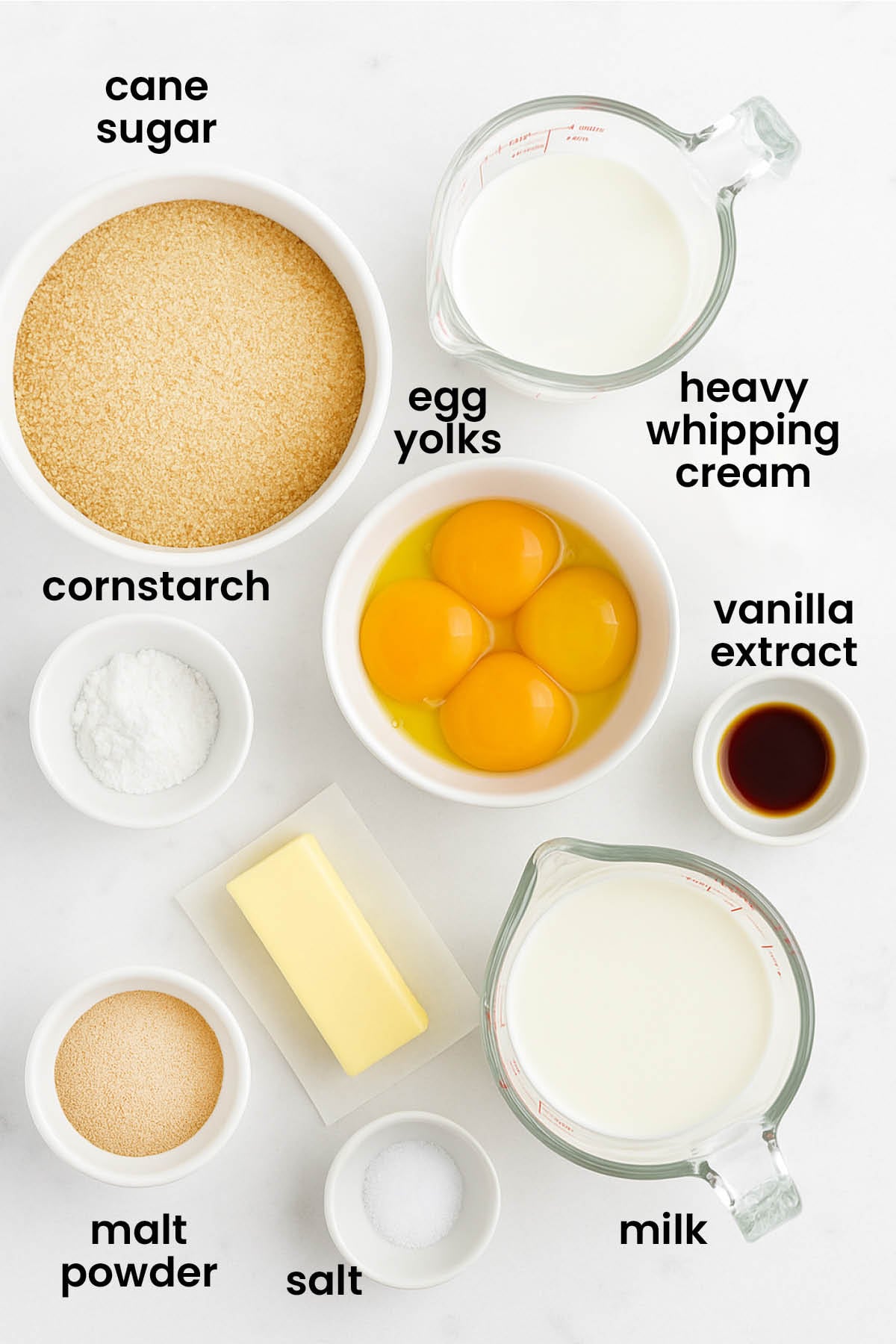 individual ingredients for homemade vanilla malt pudding laid out against a white background.