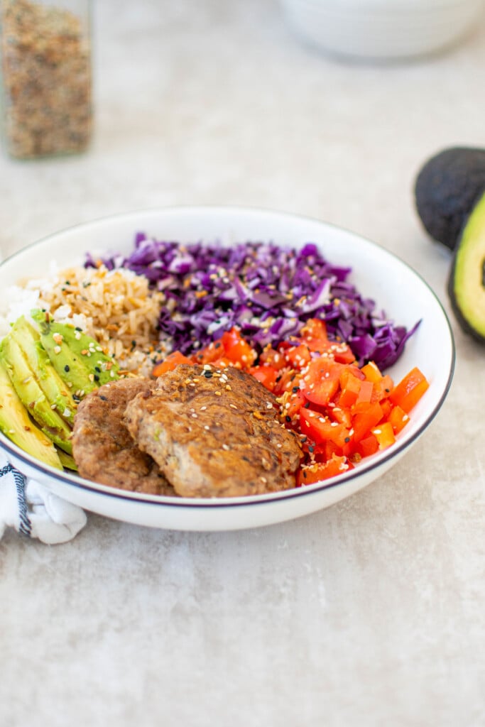 turkey avocado brunch bowl on a kitchen table.