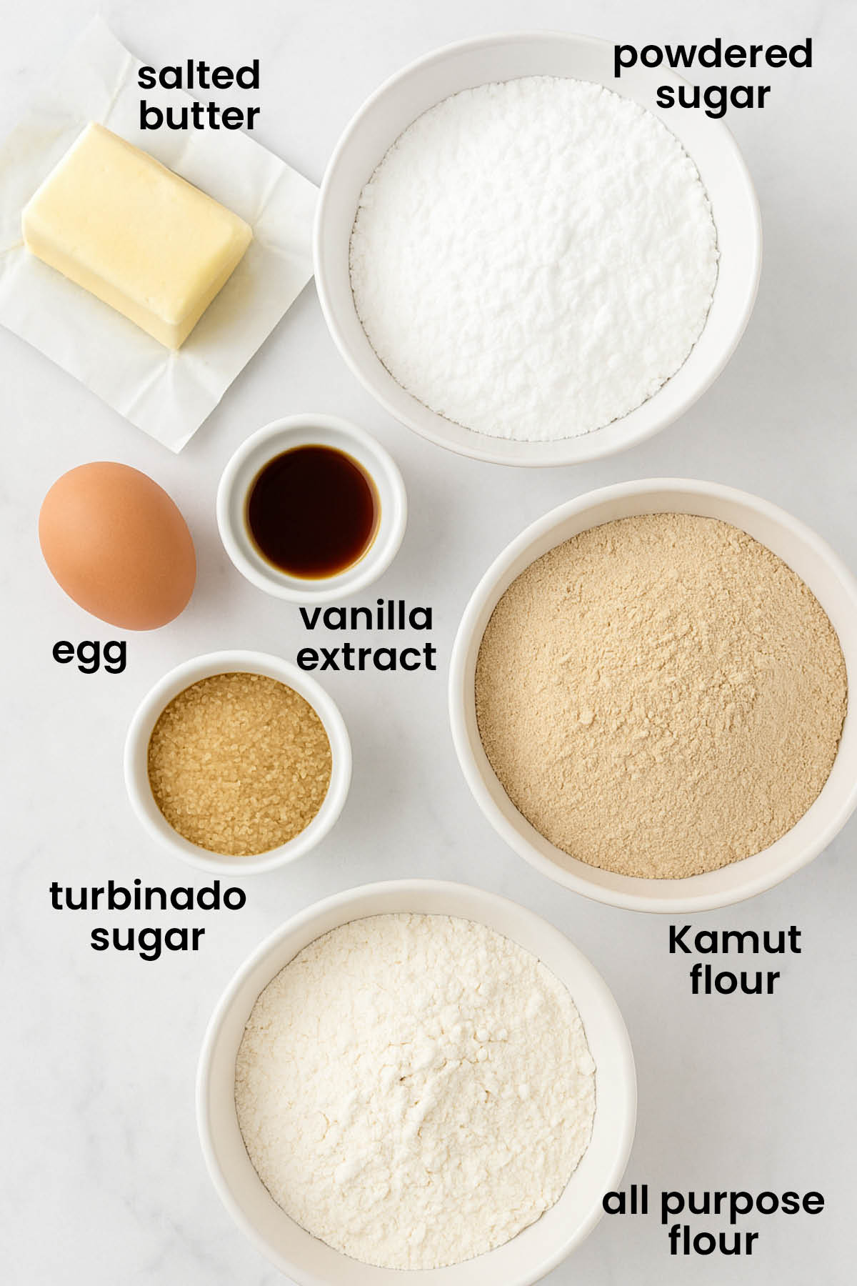 individual ingredients for kamut flour shortbread cookies laid out against a white background.