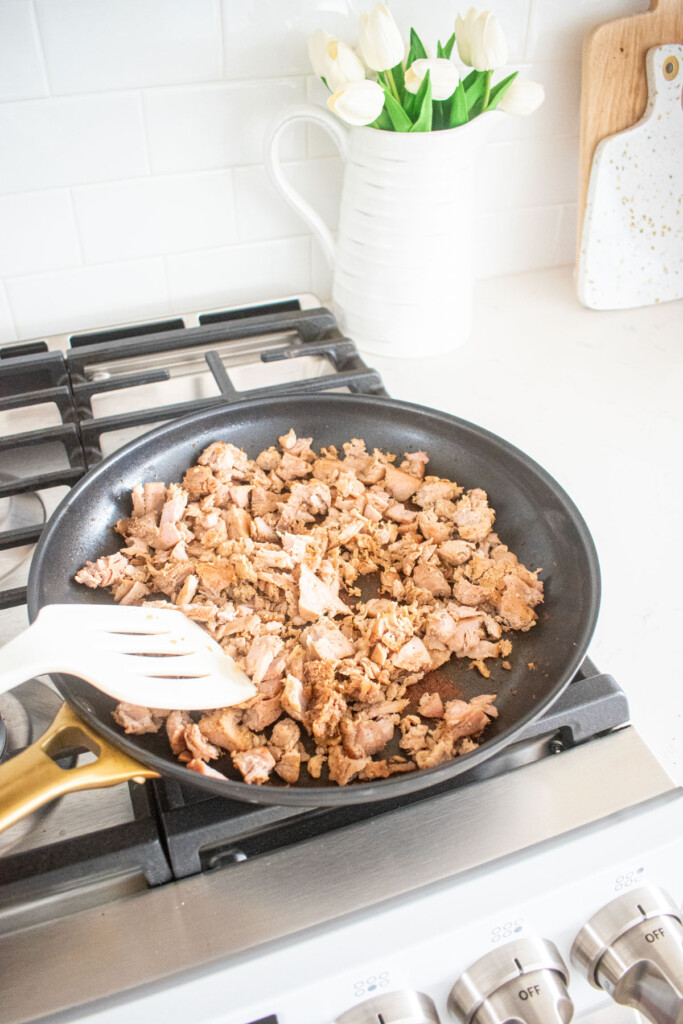 cooked ahi tuna in a large skillet on the stovetop.