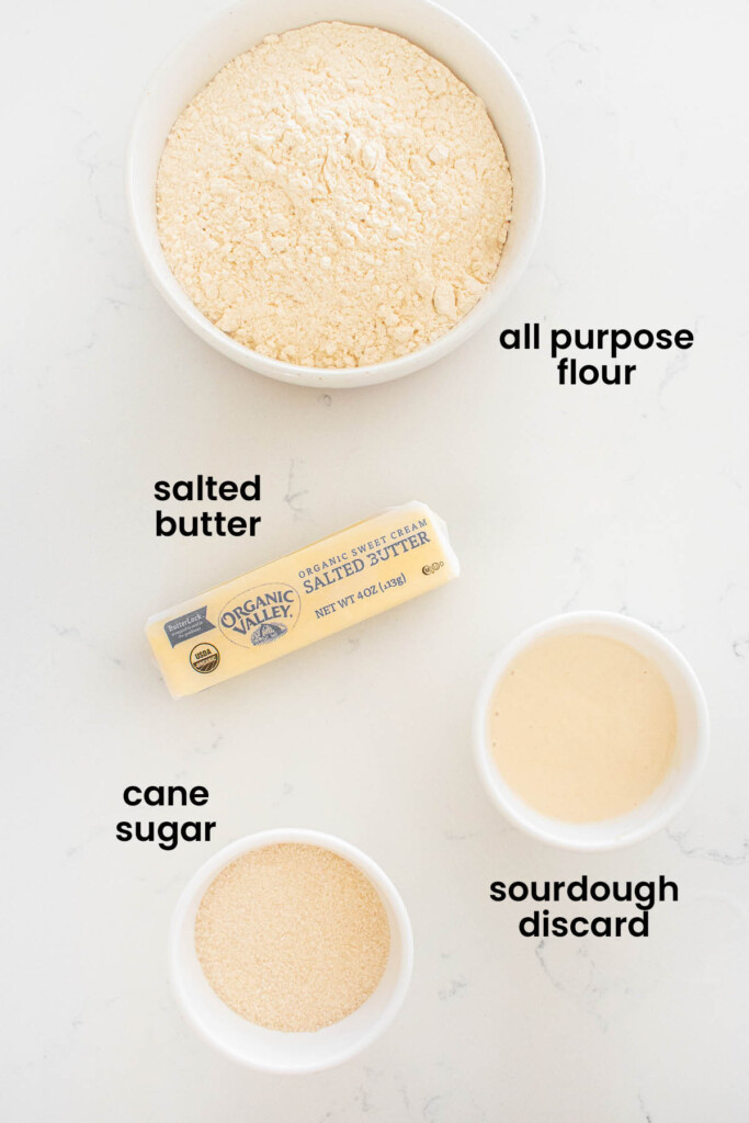 individual ingredients for sourdough peach galette laid out against a white background.
