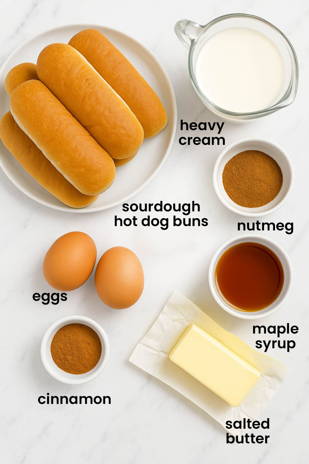 individual ingredients for sourdough french toast sticks laid out against a white background.