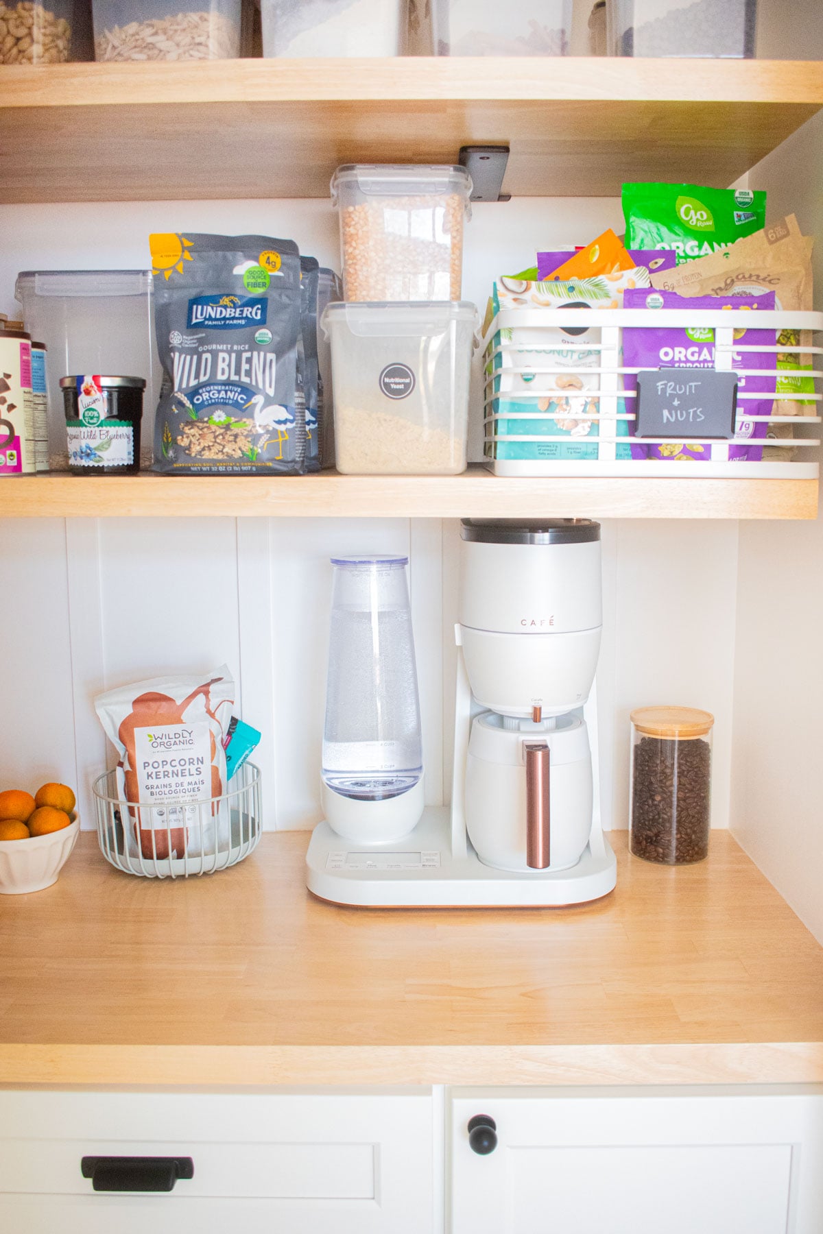 diy kitchen corner pantry wood counter with coffee maker and pantry storage bins.