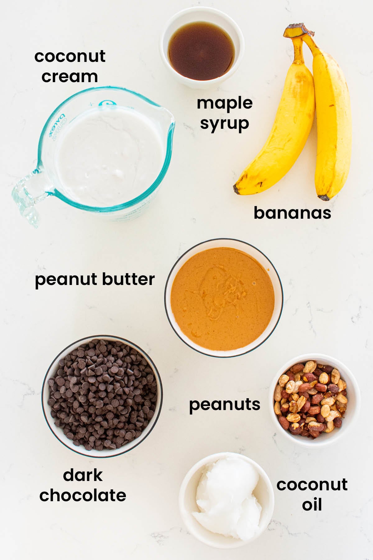 individual ingredients for vegan chocolate peanut butter ice cream bars laid out against a white background.