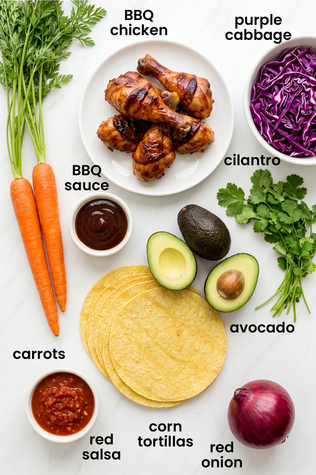 individual ingredients for bbq chicken tacos laid out against a white background.