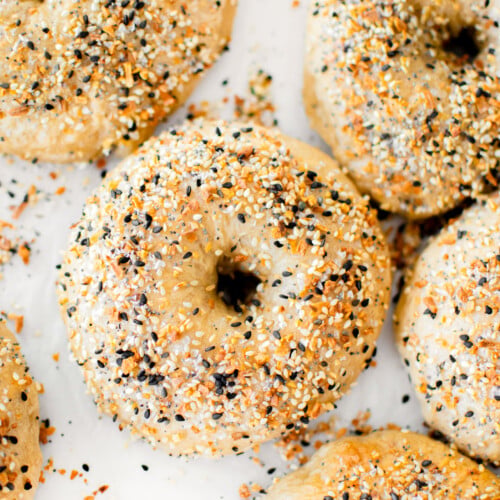 bone broth everything bagels on white parchment paper.