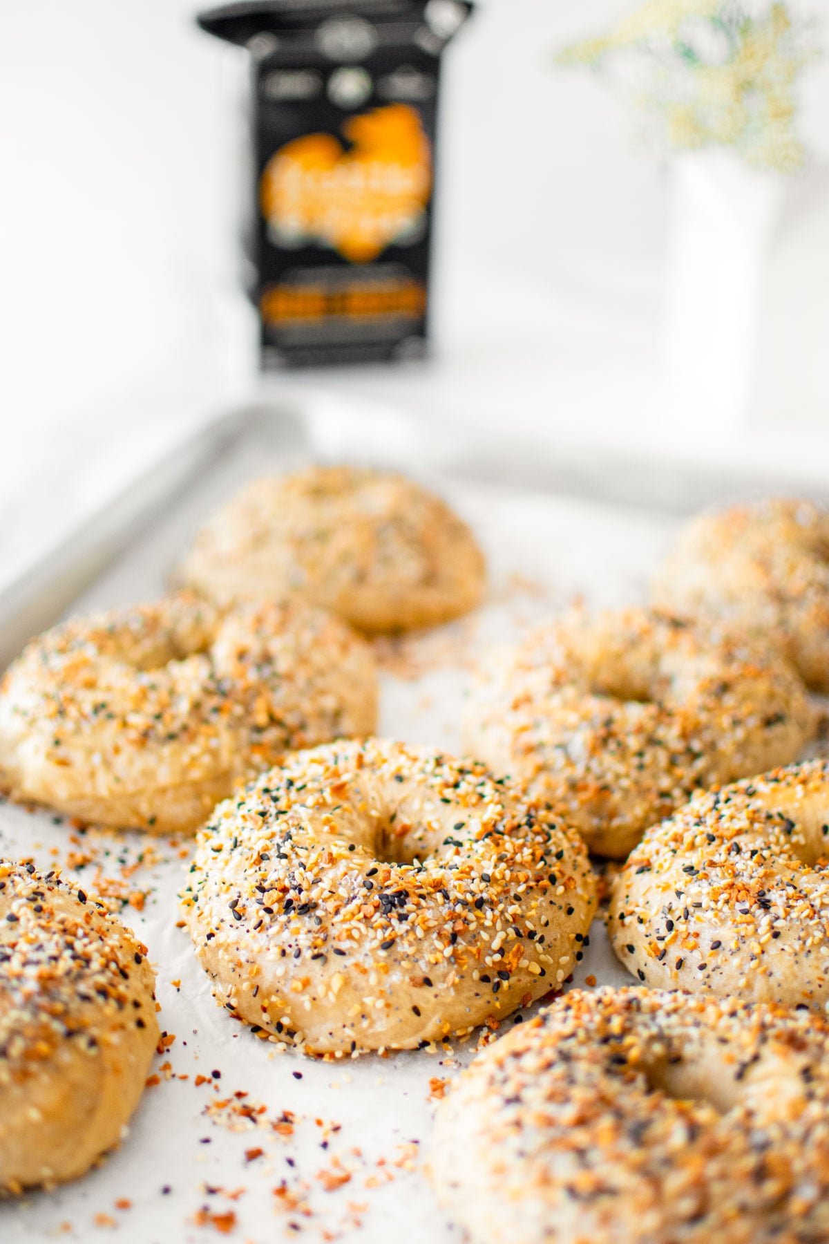 bone broth everything bagels on a baking sheet on the counter.