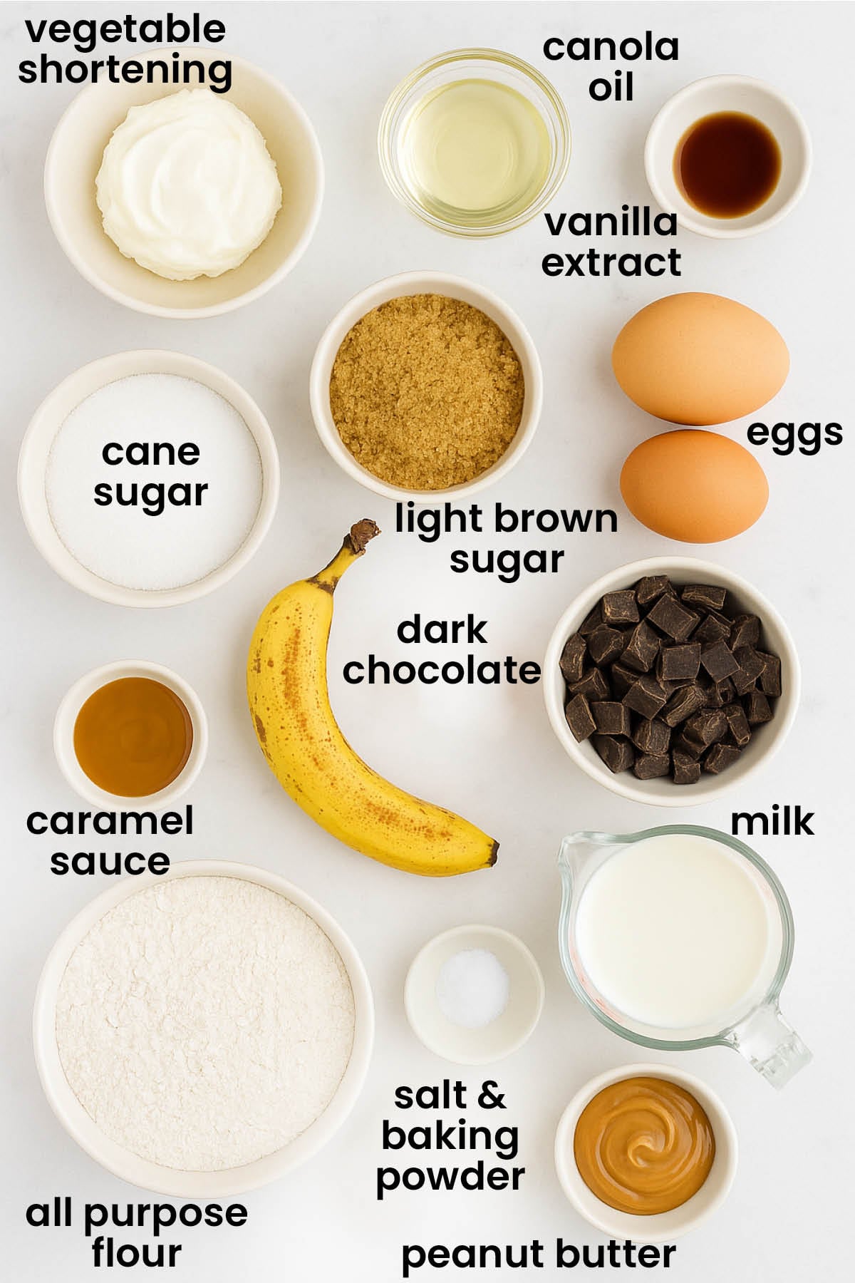 individual ingredients for chocolate peanut butter banana cake laid out against a white background.