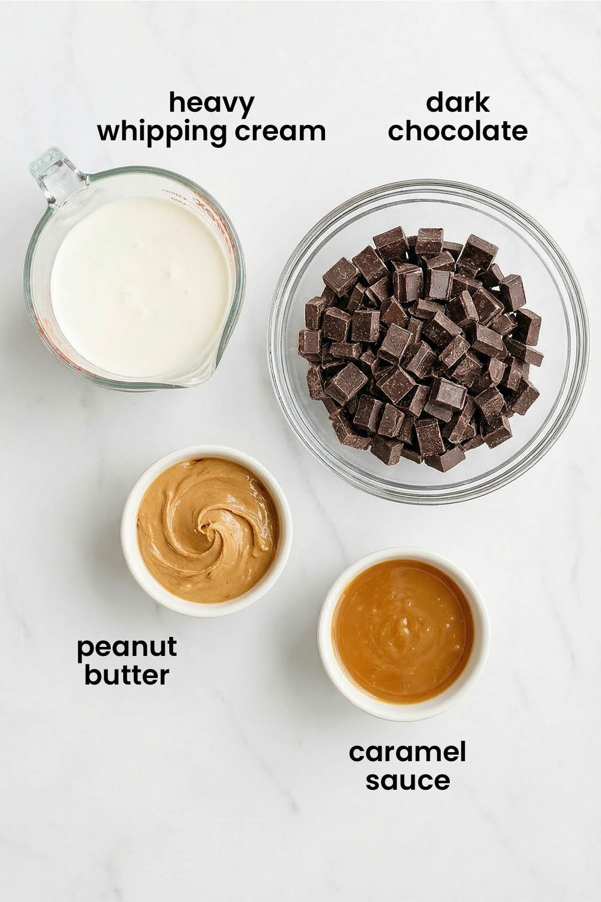 individual ingredients for peanut butter caramel chocolate ganache frosting laid out against a white background.