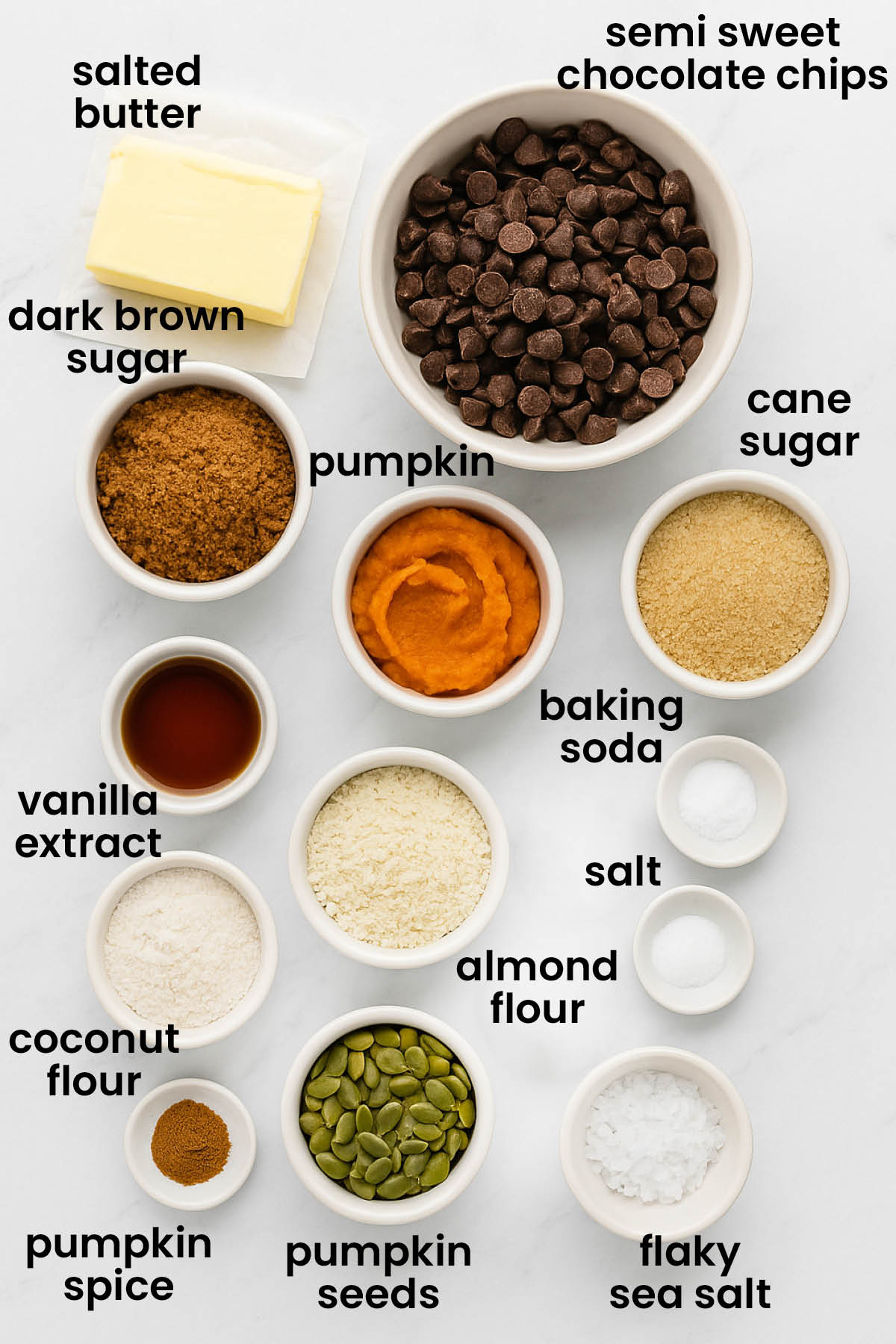 individual ingredients for the best gluten free pumpkin chocolate chip cookies laid out against a white background.
