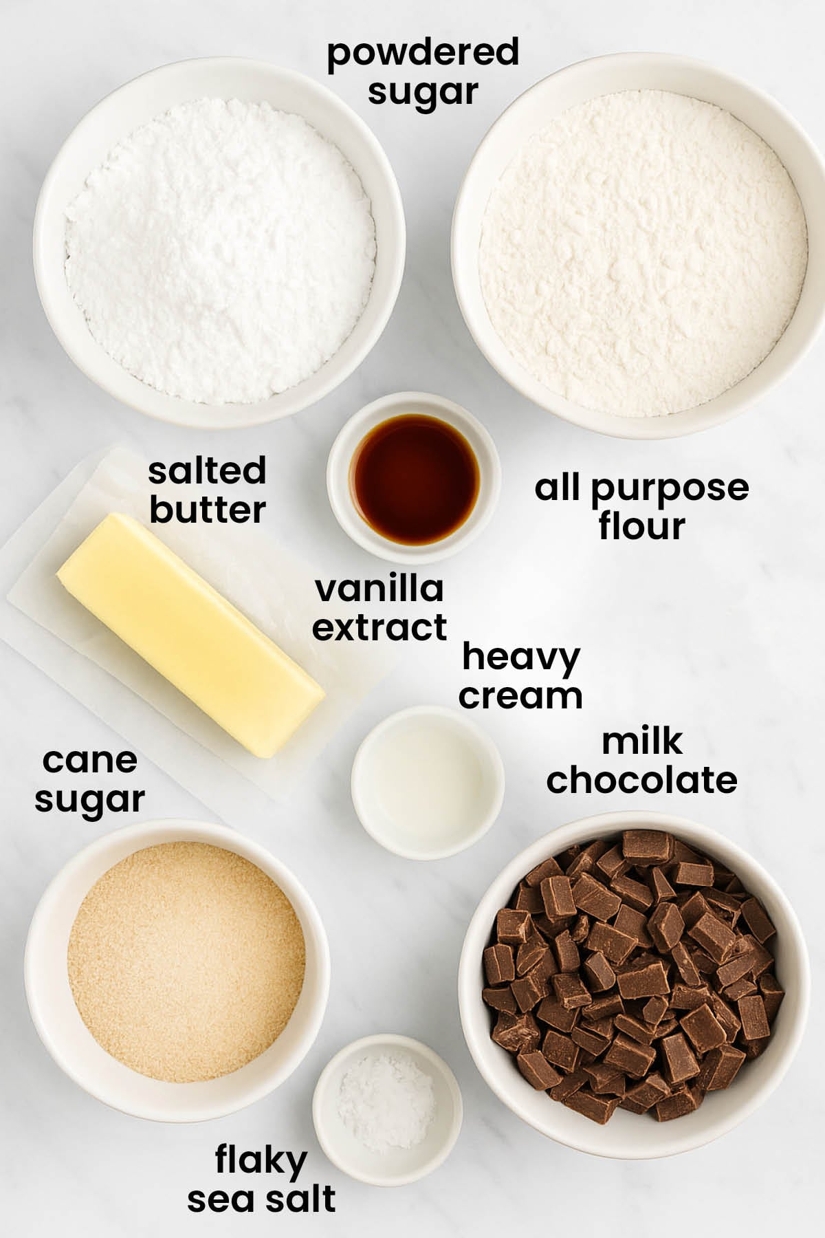 individual ingredients for homemade twix bars laid out against a white background.