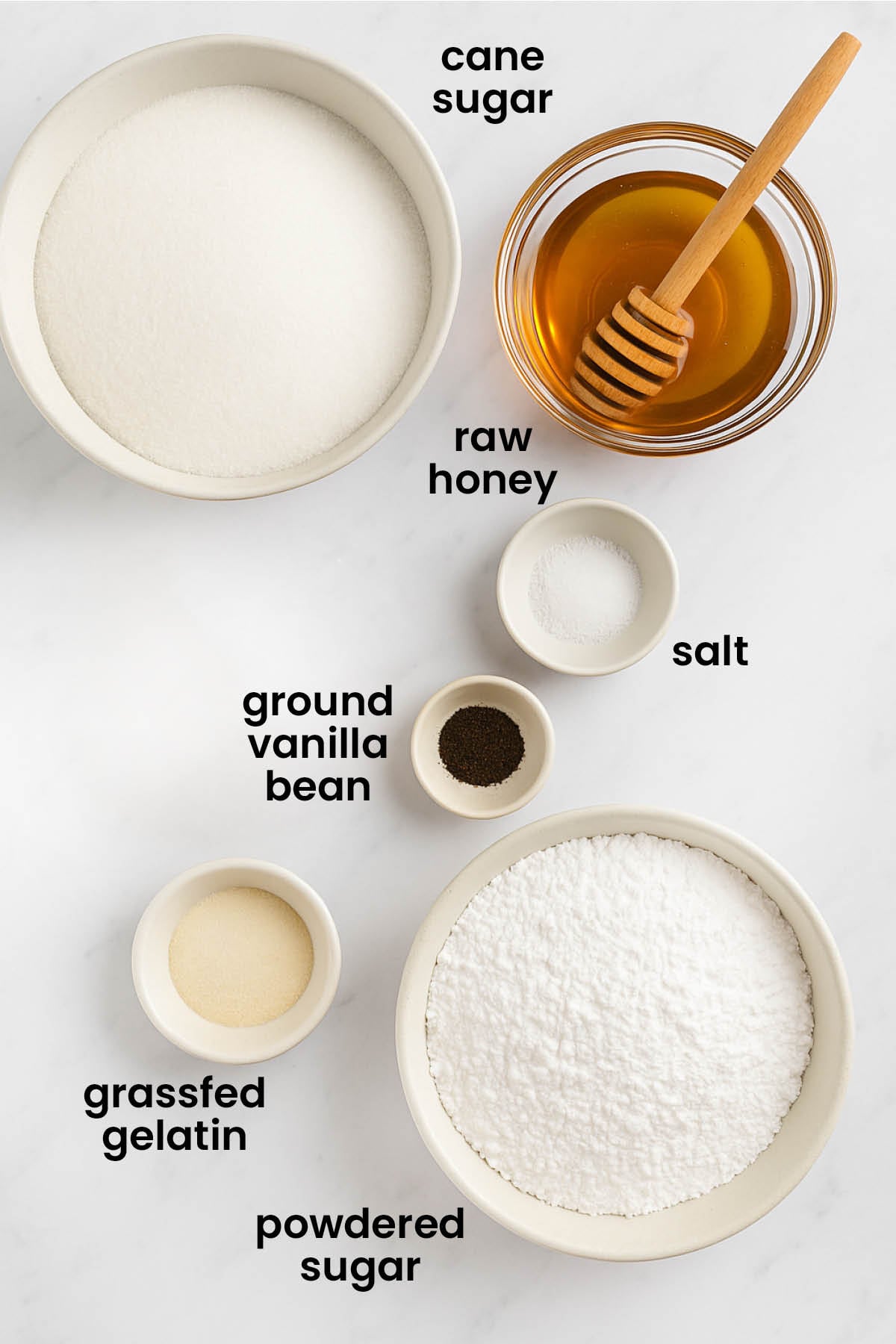 individual ingredients for homemade marshmallows without eggs laid out against a white background.