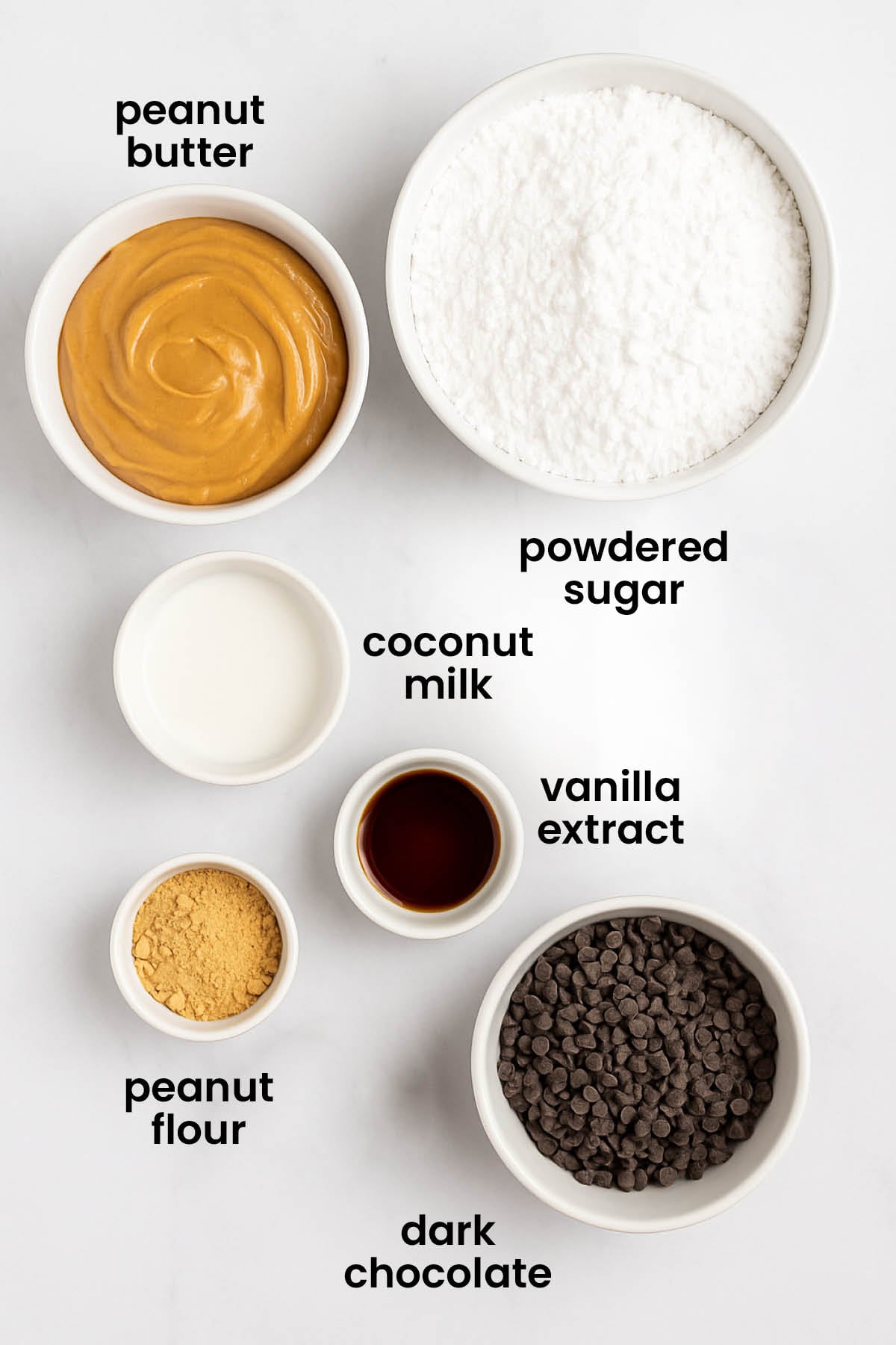 individual ingredients for vegan dark chocolate mini peanut butter cups laid out against a white background.